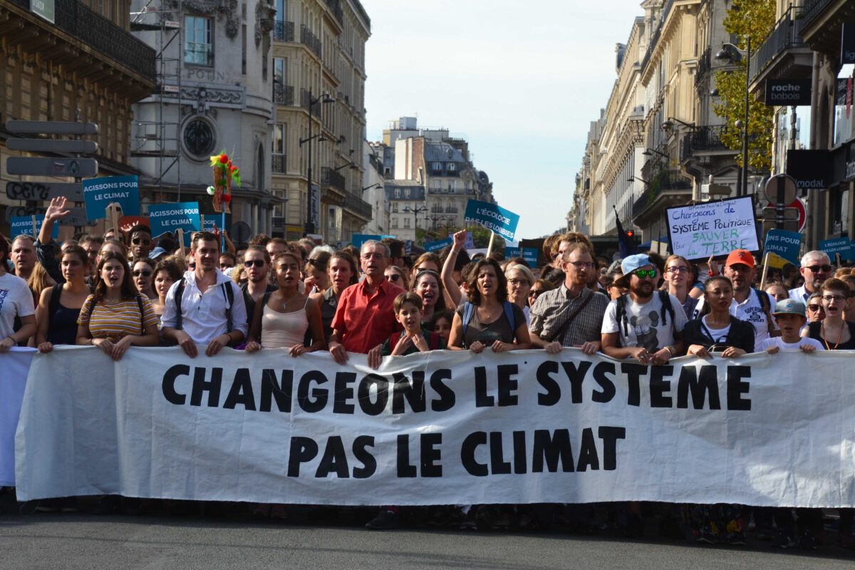 People protesting inaction on climate change, photo: Jeanne Menjoulet Flickr